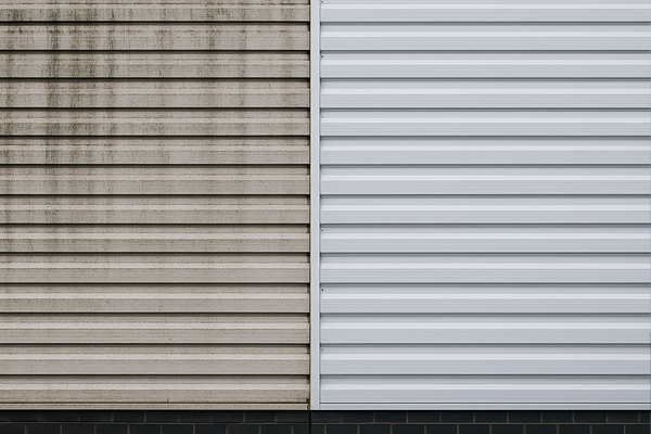 Montage of building cleaning in Machynlleth, including cladding, roofs and car park washing